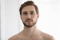 Head shot portrait handsome bearded young man looking at camera Royalty Free Stock Photo