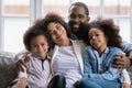 Head shot portrait happy African American family with two kids Royalty Free Stock Photo