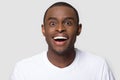 Head shot portrait of happy excited African American man Royalty Free Stock Photo