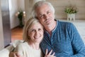 Head shot portrait happy attractive aged spouses at home Royalty Free Stock Photo