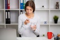 Portrait happy woman holds pill glass of water Royalty Free Stock Photo