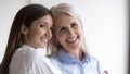 Head shot portrait of hugging beloved mother and daughter Royalty Free Stock Photo