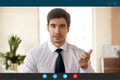 Head shot portrait screen view confident businessman mentor explaining