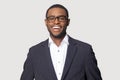 Head shot portrait smiling African American businessman wearing glasses Royalty Free Stock Photo