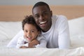 Head shot portrait smiling African American father and son Royalty Free Stock Photo