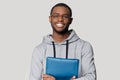 Head shot portrait smiling African American man holding folder Royalty Free Stock Photo