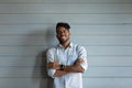 Head shot portrait smiling African American man on grey background Royalty Free Stock Photo