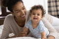 Head shot portrait smiling African American mother and toddler girl Royalty Free Stock Photo