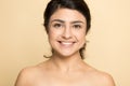 Head shot portrait smiling beautiful Indian girl with naked shoulders Royalty Free Stock Photo