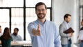 Head shot portrait smiling businessman extending hand for handshake Royalty Free Stock Photo