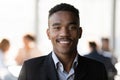 Head shot portrait smiling confident African American businessman in suit Royalty Free Stock Photo