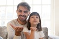 Head shot portrait of smiling father and daughter making video call Royalty Free Stock Photo