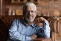 Head shot portrait smiling grey haired mature man wearing glasses Royalty Free Stock Photo