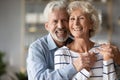 Head shot portrait smiling older wife and husband hugging Royalty Free Stock Photo
