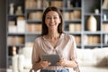 Head shot portrait smiling woman holding computer tablet in hands Royalty Free Stock Photo