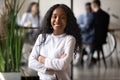 Head shot portrait of smiling young african american female professional.