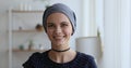 Head shot portrait young woman wear headkerchief pose indoor