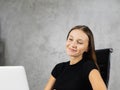 head shot pretty caucasian woman using computer and looking at laptop in online meeting with copy space at background Royalty Free Stock Photo