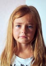 Head shot pretty lovely frustrated small daughter Royalty Free Stock Photo