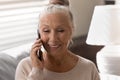 Head shot smiling mature woman making phone call, chatting Royalty Free Stock Photo