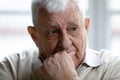 Head shot thoughtful upset elderly man thinking about problems Royalty Free Stock Photo