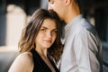 Head shot of young affectionate romantic couple in love.Concept of first kiss, tenderness and amorousness. Close up portrait of