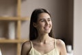 Head shot portrait woman smile looking into distance