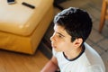 Head shot of young boy concentrating on playing video games Royalty Free Stock Photo