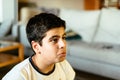 Head shot of young boy concentrating on playing video games Royalty Free Stock Photo