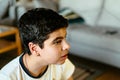 Head shot of young boy concentrating on playing video games Royalty Free Stock Photo