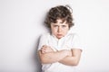 Head and Shoulders Close Up Portrait of Young boy with Sulk attitude
