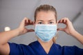 head and shoulders portrait female doctor wearing protective mask Royalty Free Stock Photo