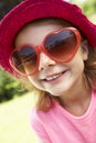 Head And Shoulders Portrait Of Girl Wearing Pink Straw Hat Royalty Free Stock Photo