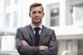 Head And Shoulders Portrait Of Young Businessman In Office Royalty Free Stock Photo