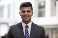 Head And Shoulders Portrait Of Young Businessman In Office Royalty Free Stock Photo