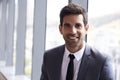 Head And Shoulders Portrait Of Young Businessman In Office Royalty Free Stock Photo