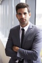 Head And Shoulders Portrait Of Young Businessman In Office Royalty Free Stock Photo