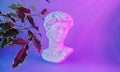 Head of a statue David by Michelangelo. Colorful neon image with greek sculpture, surreal art style. Copy space Royalty Free Stock Photo