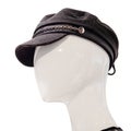 Head of a white abstract mannequin in a black cap on a white background Royalty Free Stock Photo