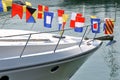 Head of yacht and colorful flag