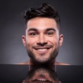 Head of young man with smug expression Royalty Free Stock Photo