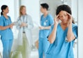 Headache, anxiety or sad surgeon in meeting with doctors with burnout, stress or fatigue with medical emergency
