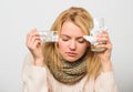Headache and cold remedies. Flu and cold concept. Woman tousled hair scarf hold tablets blister. Guidelines for treating