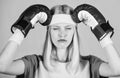 Headache concept. Keep calm and get rid of headache. Beat headache. Girl boxing gloves tired to fight. Strong woman