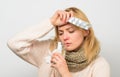 Headache and fever remedies. Woman tousled hair scarf hold tablets blister. Guidelines for treating fever. Take