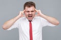 man standing and touching his painful head and screaming Royalty Free Stock Photo