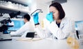 Headache, science and research with a woman at work in a laboratory with anxiety or suffering burnout. Doctor, stress Royalty Free Stock Photo