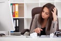 Headache and Stress at Work. Portrait of Young Business Woman at Royalty Free Stock Photo