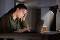 Headache, woman with laptop at night and burnout, glitch or 404 with corporate stress and fatigue, pain and crisis Royalty Free Stock Photo