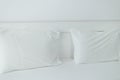 headboard, pillows in a white bed Royalty Free Stock Photo